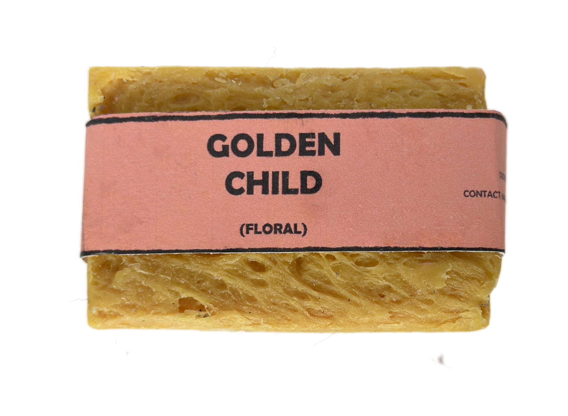 Golden Child floral handmade soap bar by Bouncing Soaps showing golden yellow rustic texture from above on white background